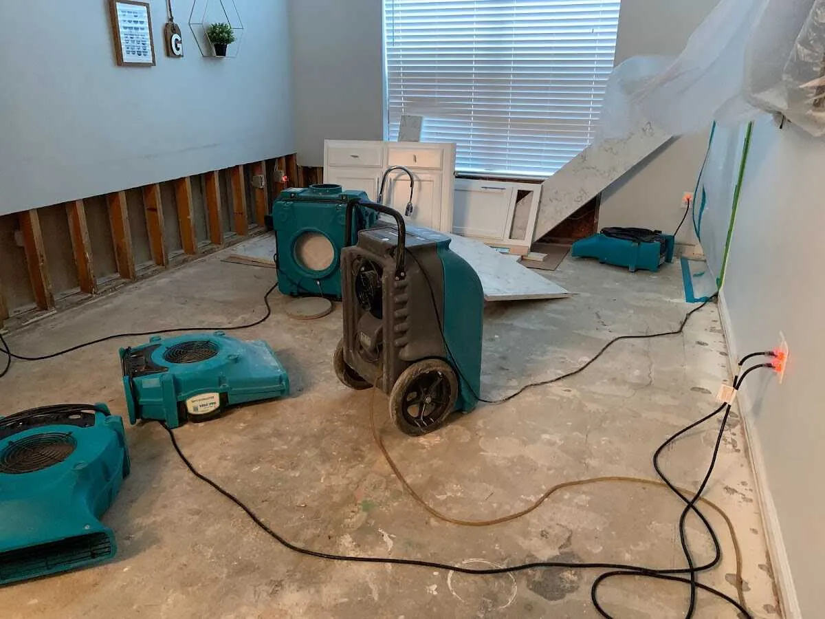 Dehumidifier in flood-cut room for Water Damage Restoration in Rosemead